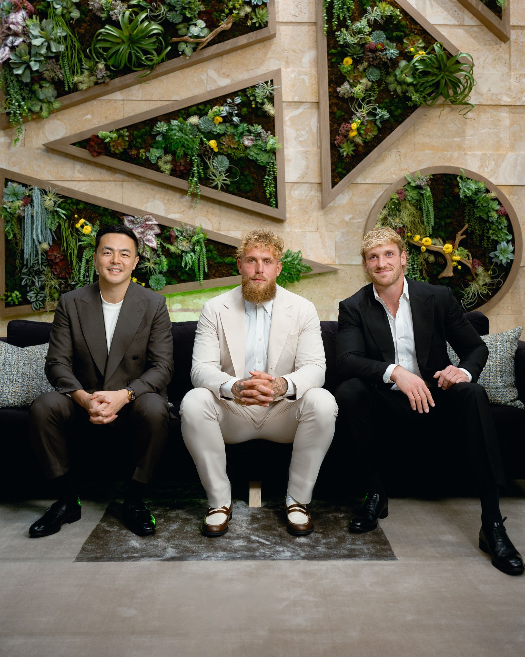 Geoff Woo, Jake Paul, and Logan Paul seated together.